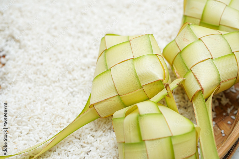 The composition of rice and ketupat which is a traditional food to celebrate Eid for Indonesian Muslims.
