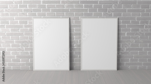 Mock up of two vertical frames on the floor in white interior. photo