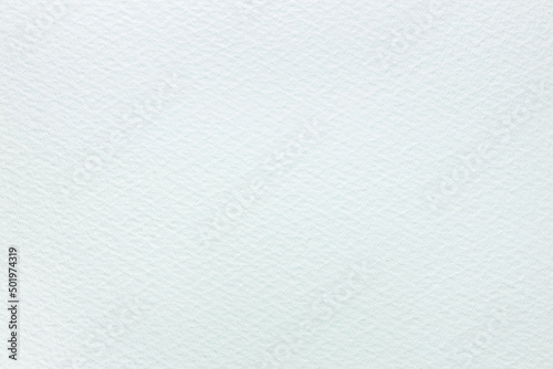 white watercolor paper with embossed surface. highly-textured background.