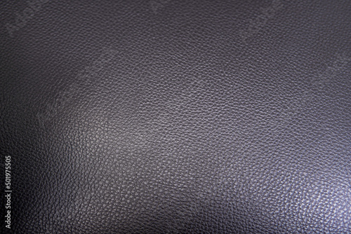 gradient black artificial leather texture, black background