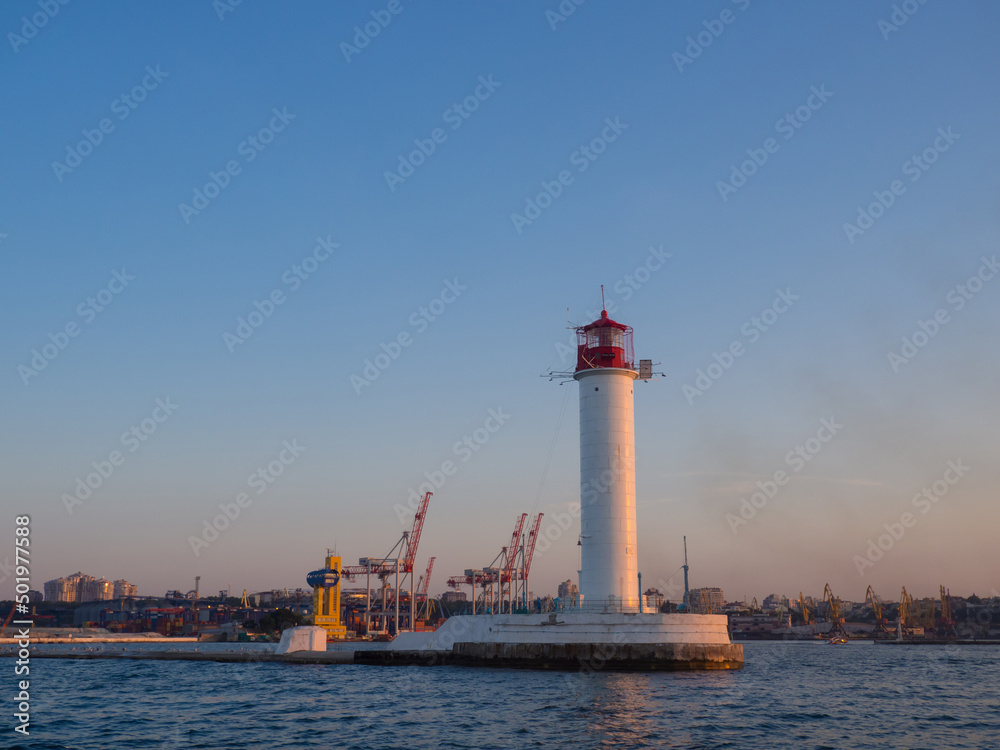 The Vorontsov Lighthouse in the Black Sea port of Odessa, Ukraine in the evening. The current lighthouse is the third to stand on the same spot. The first was built in 1862 and was made of wood.