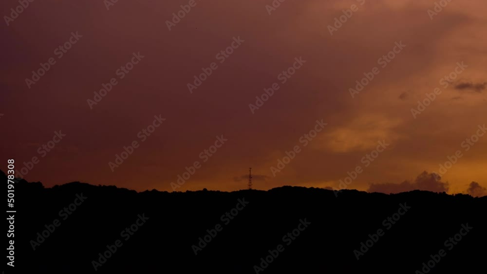 Time lapse beautiful nature of blue sky and clouds at sunset with silhouettes of mountains. Time lapse beautiful nature of blue sky and clouds at sunset with silhouettes of mountains.