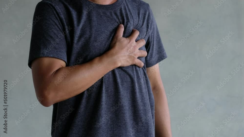 A middle-aged man felt severe chest pain. heart attack caused by stress, heart disease, Human pain A middle-aged man felt severe chest pain. heart attack caused by stress, heart disease, Human pain