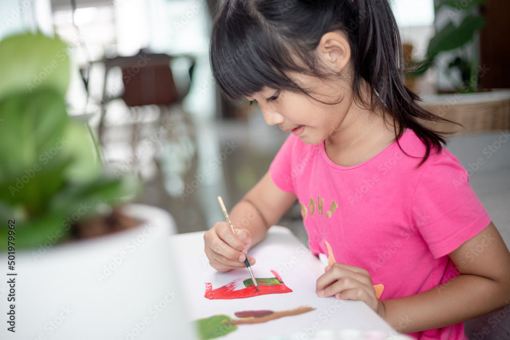 Girl Painting Picture On Table At Home Girl Painting Picture On Table At Home