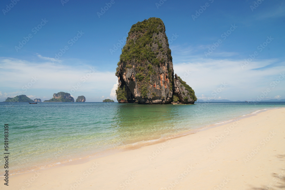 Landscape Traveller on Railay Phranang Beach  white sand and blue sea with limestone in Railay Ao nang Krabi Thailand - sunny day summer    