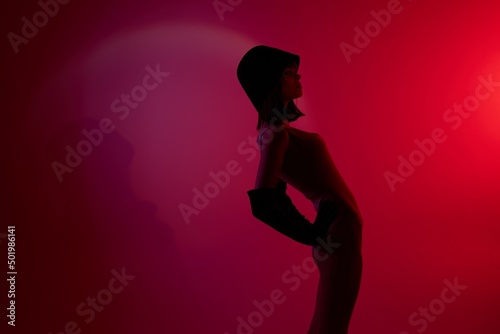 Neon scene silhouette woman red light