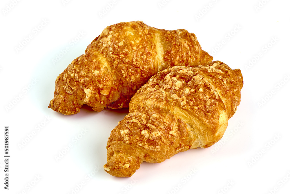 Freshly baked croissants, isolated on white background.