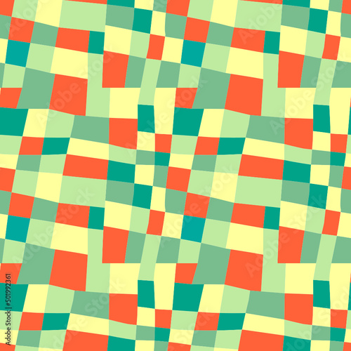 Abstract checkered pattern for fabric or background. Green-yellow tones with orange splashes.