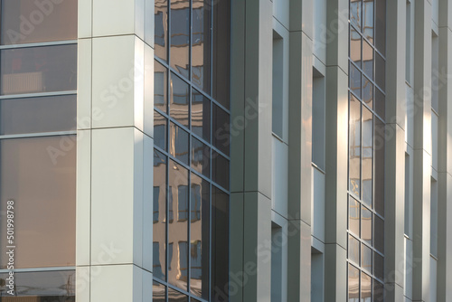 Commercial external metal composite panels on a office building background. Cladding durable metal composite panels protect decoration modern building