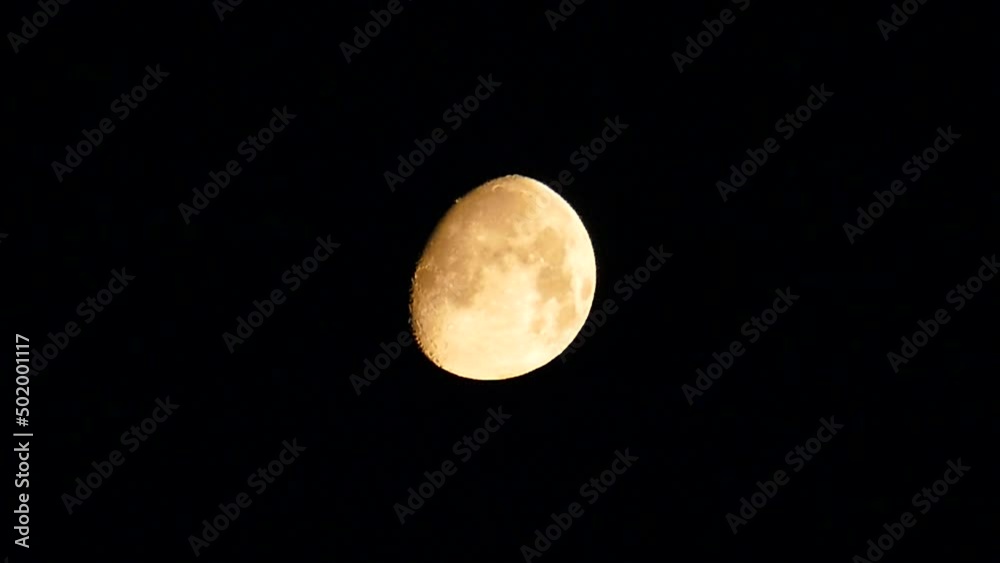phases of the moon - bloated moon,night bloated moon,yellow toned bloated moon, 4k video, phases of the moon - bloated moon,night bloated moon,yellow toned bloated moon, 4k video,