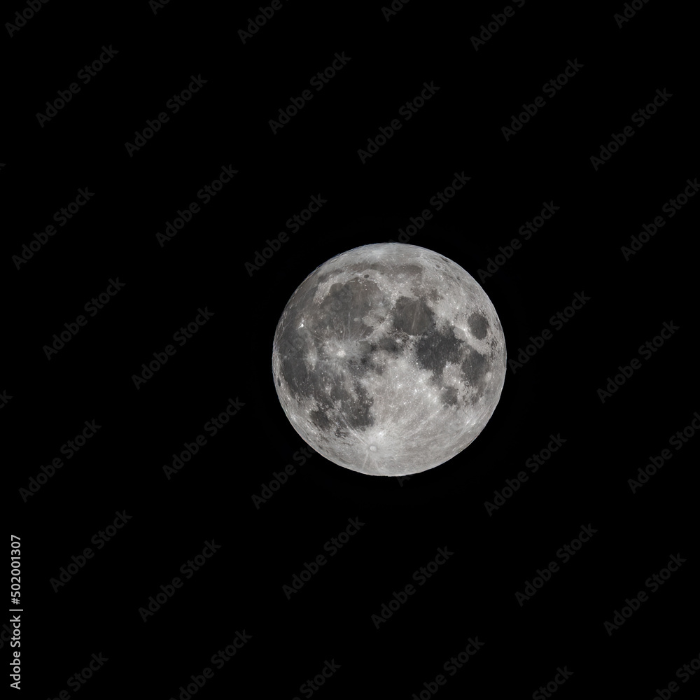 Detailed image of the full moon isolated on black. Detailed image of the full moon isolated on black.
