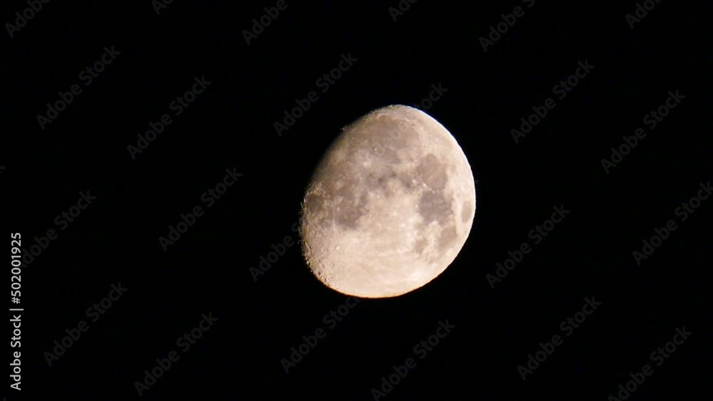 phases of the moon - bloated moon,night bloated moon,yellow toned bloated moon, 4k video, phases of the moon - bloated moon,night bloated moon,yellow toned bloated moon, 4k video,