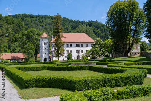 POLHOV GRADEC mansion with blooming garden in summer