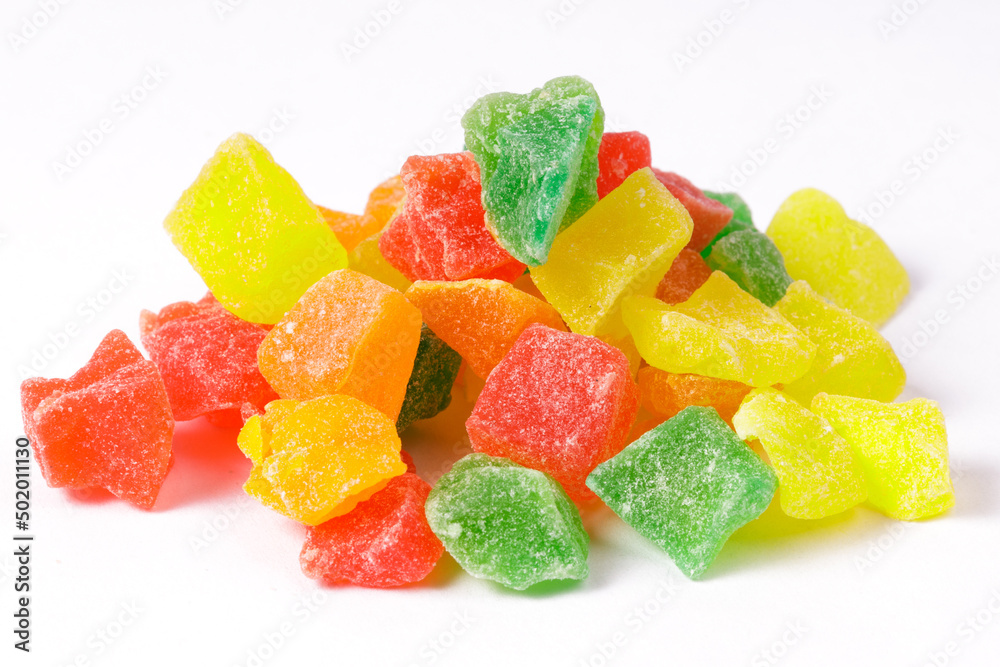 a bunch of colorful candied fruits close-up. sweet dessert a bunch of colorful candied fruits close-up. sweet dessert