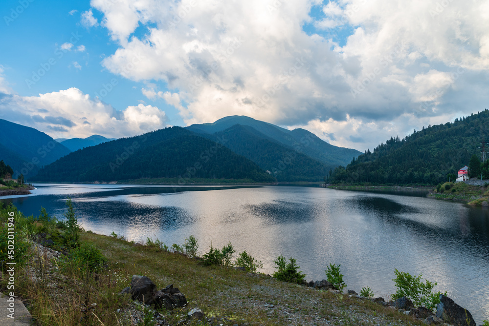 Gura Apelor dam with hills on the background in Romania