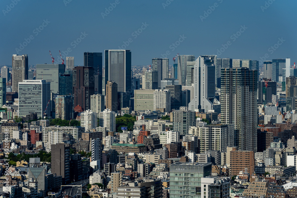 Urban landscape with dense buildings at central Tokyo area. Urban landscape with dense buildings at central Tokyo area.