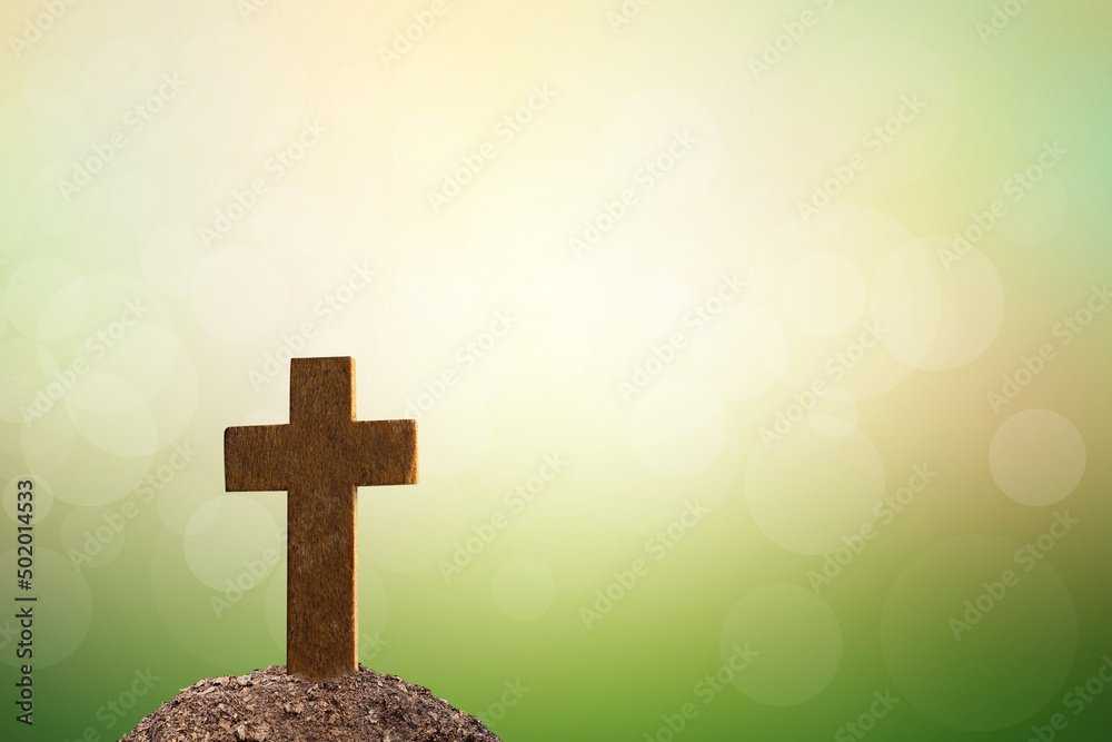cross on tomb nature blur background cross on tomb nature blur background