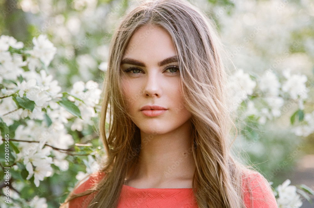 Beautiful young woman in summer garden. Beauty summertime. Film photography Beautiful young woman in summer garden. Beauty summertime. Film photography