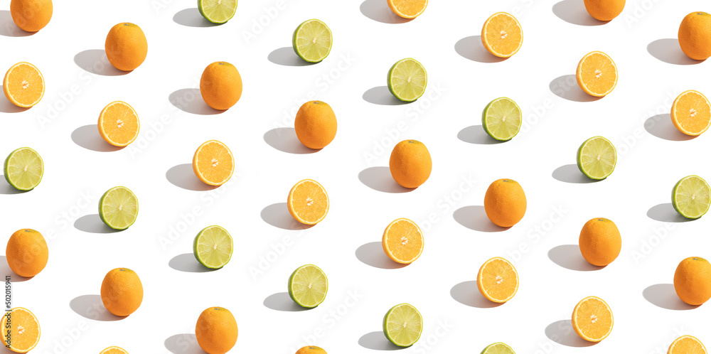 Banner with citrus sliced orange and lime isolated on white. Abstract summer background