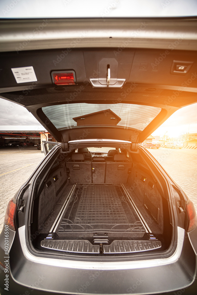 Fototapeta premium Clean open empty trunk in the car