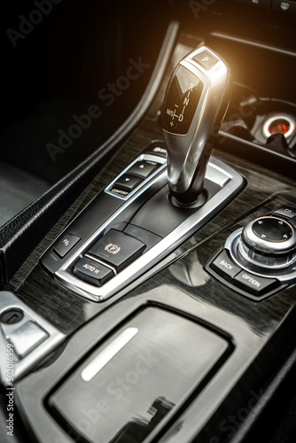 Control panel dashboard car fragment. Automatic transmission gear shift in car