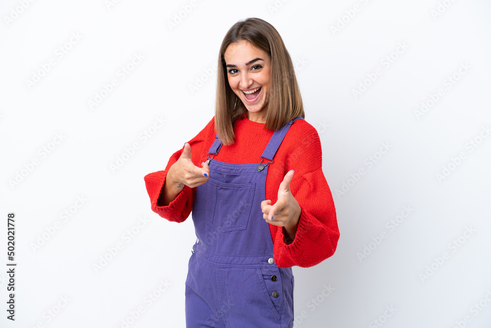 Young caucasian woman isolated on white background pointing to the front and smiling Young caucasian woman isolated on white background pointing to the front and smiling