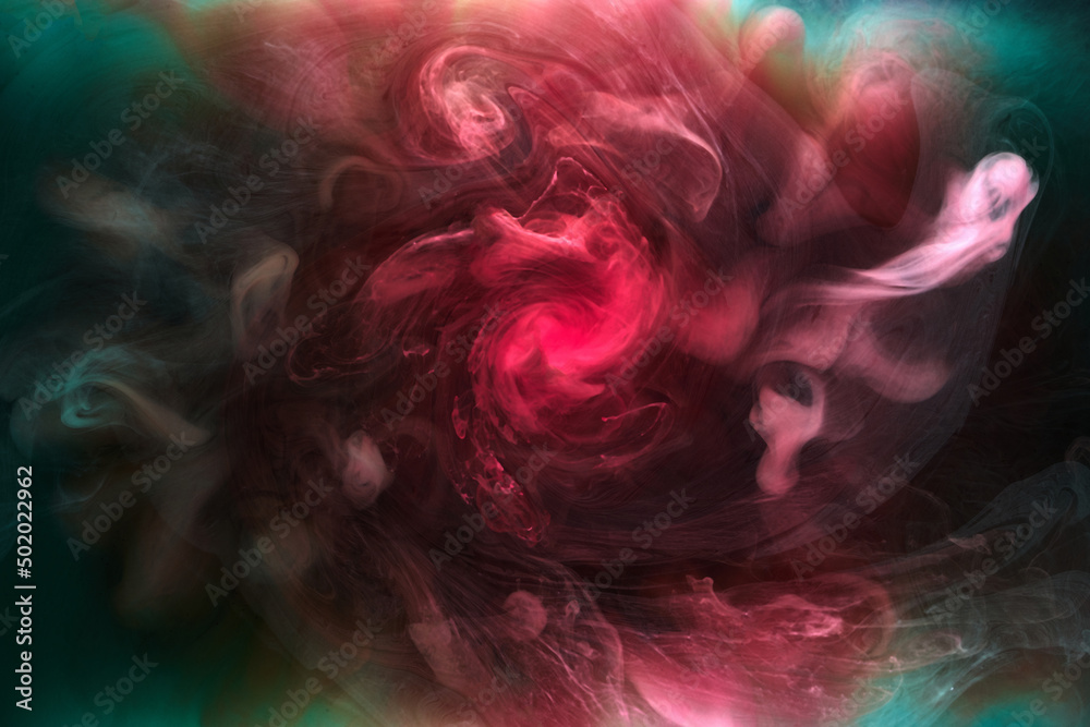 Fototapeta premium Green pink smoke on black ink background, colorful fog, abstract swirling touch ocean sea, acrylic paint pigment underwater