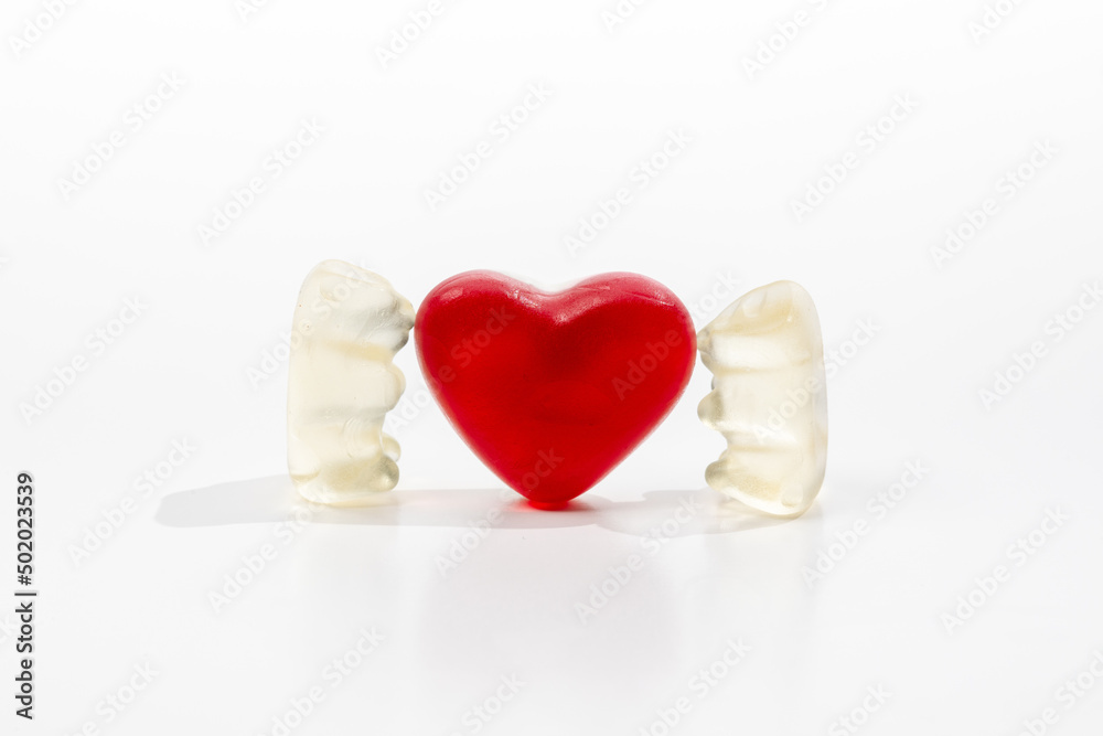 Fototapeta premium Love Concept with Gummi Bears and red heart