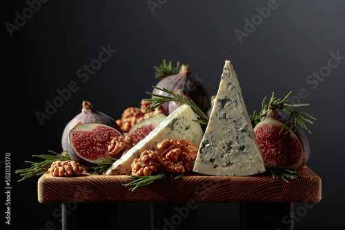 Blue cheese with figs, walnuts, and rosemary.