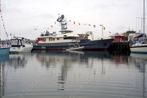 Dr No luxury motor yacht. May Day flags Padstow Cornwall Egnland UK May 1st 2022