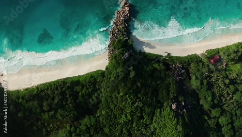 Aerial flat slider over Pointe Belize and Petite Anse Beach