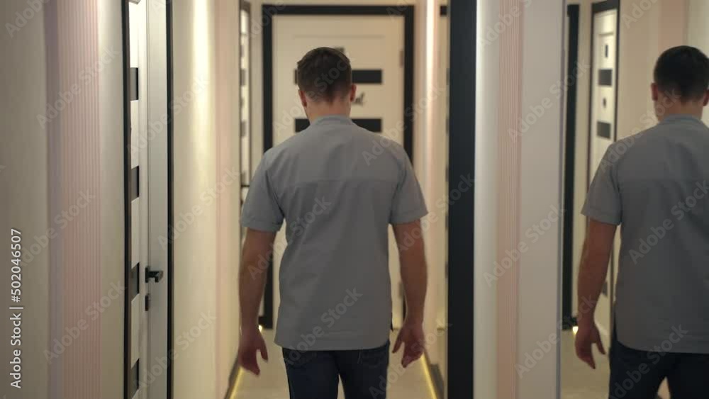 Doctor walks down the hallway Doctor walks down the hallway
