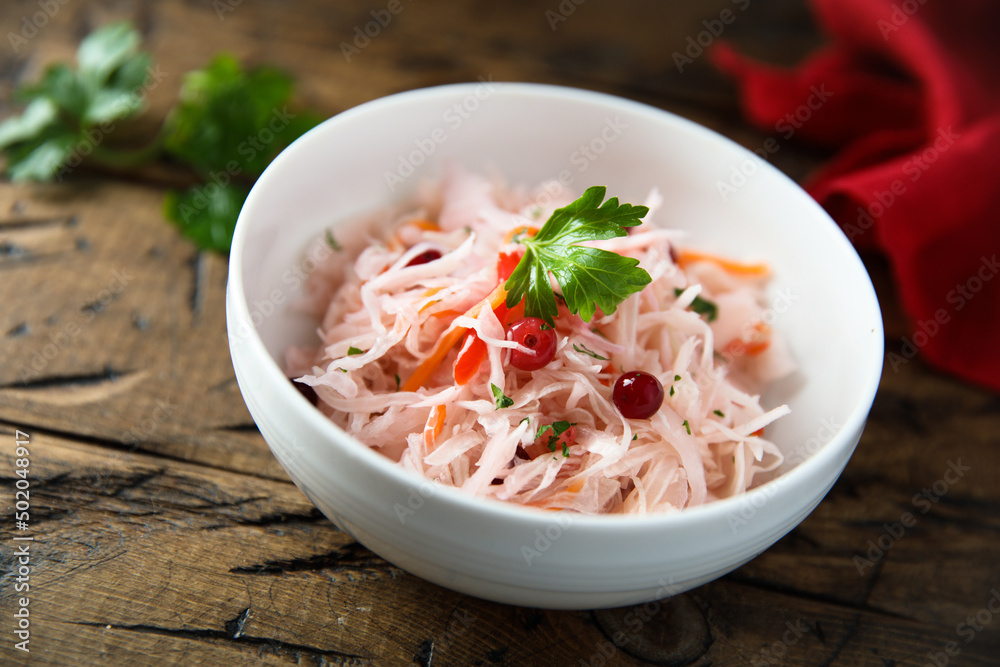 Traditional homemade sauerkraut with cranberry Traditional homemade sauerkraut with cranberry
