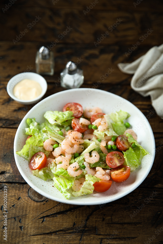 Leaf salad with cherry tomatoes and shrimps Leaf salad with cherry tomatoes and shrimps