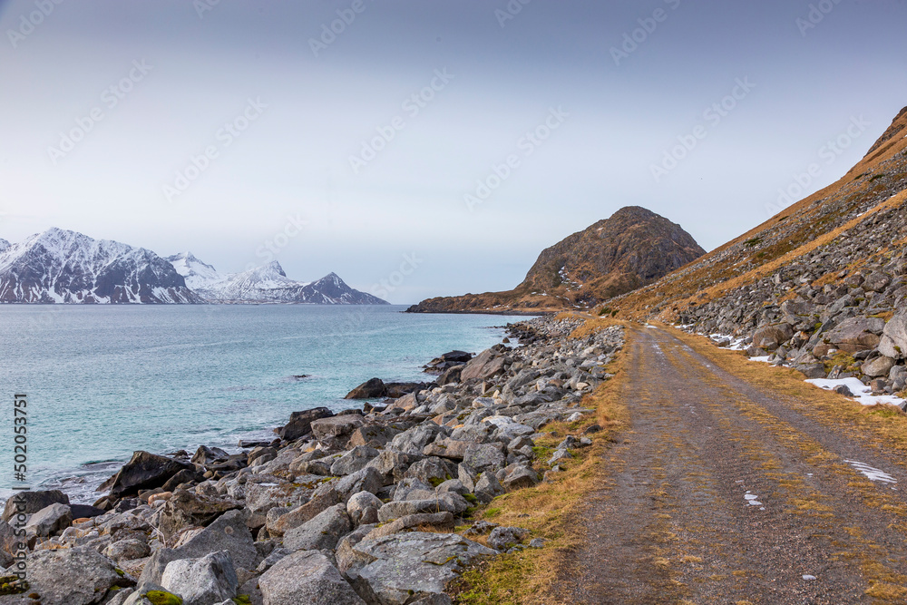 Old gravel road at Uttakleiv in Lofoten Islands. Norway.