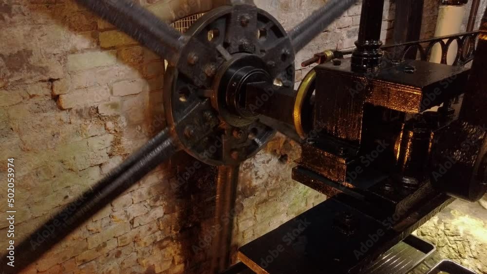 An atmospheric engine, used to power a cotton mill. Detail of flywheel and crank An atmospheric engine, used to power a cotton mill. Detail of flywheel and crank