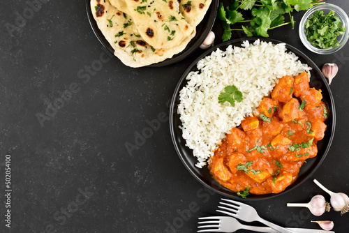 Fototapeta Indian chicken curry with rice on plate