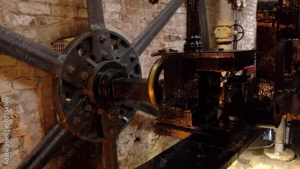 An atmospheric engine, used to power a cotton mill. Detail of flywheel and crank An atmospheric engine, used to power a cotton mill. Detail of flywheel and crank