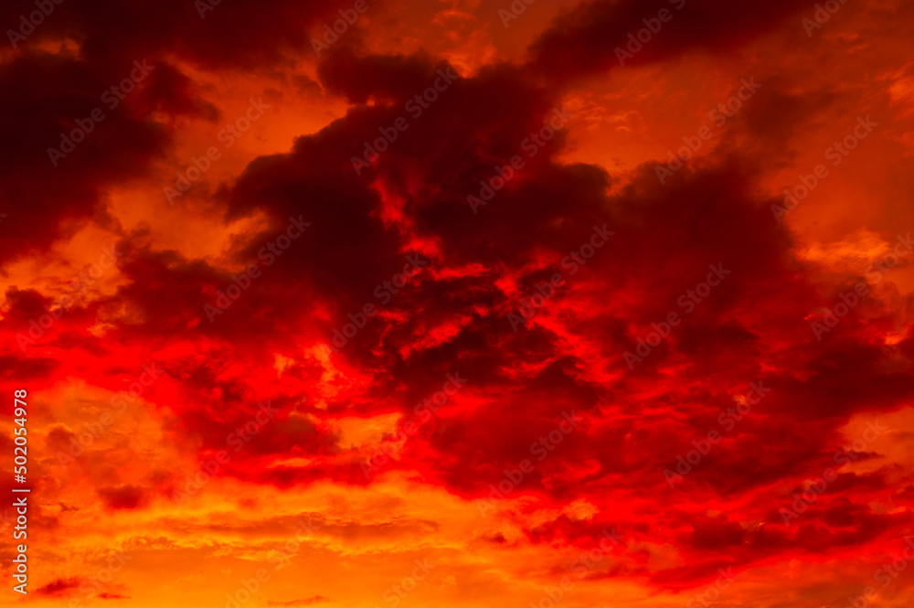 Red and black clouds in the sky, summer sunset
