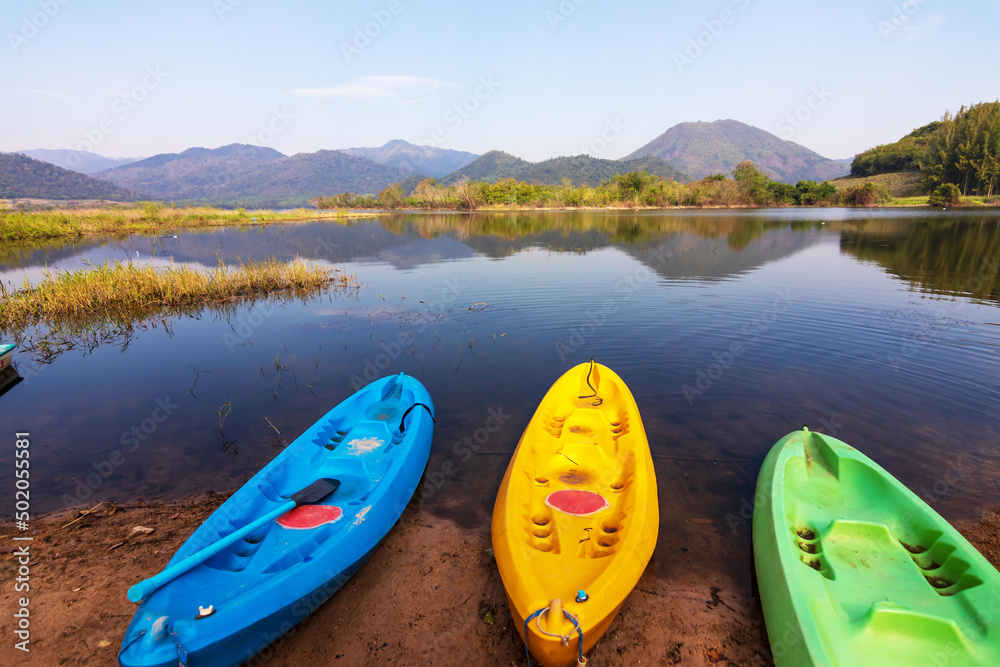 Beautiful landscape of lake and range of mountain with pine forest. Tha Khoei reservoir in Ratchaburi, Thailand. Beautiful landscape of lake and range of mountain with pine forest. Tha Khoei reservoir in Ratchaburi, Thailand.