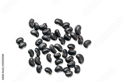 Top view of uncooked black beans (Vigna Mungo) isolated on white background. photo
