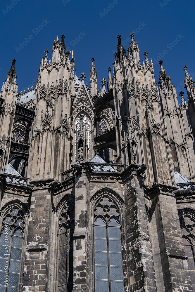 Details of Cologne cathedral (Cathedral Church of Saint Peter, from 1248). Cologne Cathedral - High Gothic five-aisled basilica, with a projecting transept and a tower facade. Cologne, Germany.