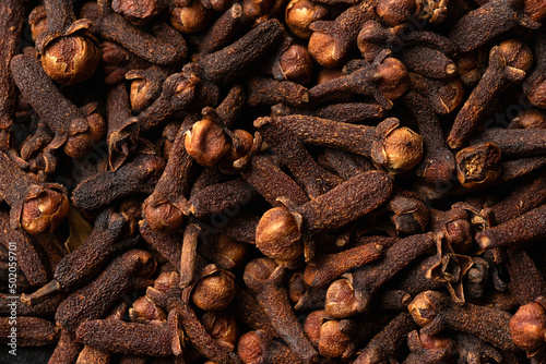 Drieyd Aromatic cloves, spice. Macro photo, background.