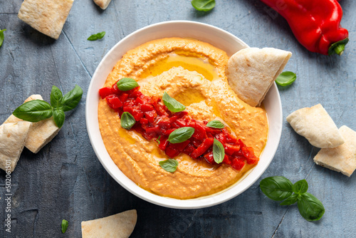 Roasted red pepper hummus with pita bread. Healthy food