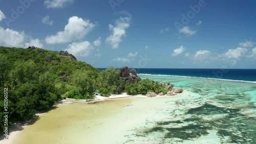 Aerial dolly from Anse Union beach toward to Anse Source d'Argent