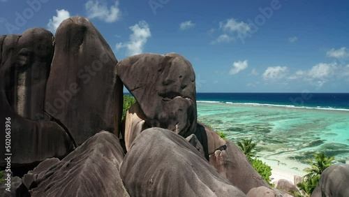 Aerial slider from statues of granite boulders with triangular hole