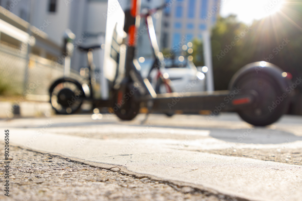 Electric scooters in a city blurred Electric scooters in a city blurred