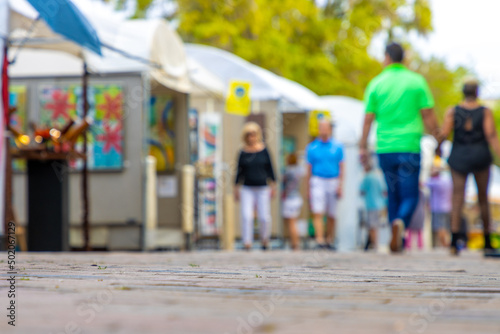 Sidewalk art festival blurred