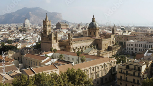 View over the small historic city of Segovia in central Spain. Action. Aerial top view of the Old city and Cathedral in a sunny summer day.