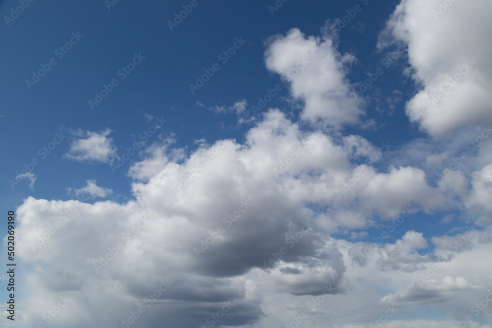 Blue sky background with clouds.Beautiful summer sky. Blue sky background with clouds.Beautiful summer sky.